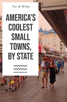 people walking on the boardwalk in front of some stores and buildings with a sign that says america's coolest small towns by state