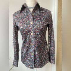 Amazing Vintage Condition. No Flaws That I Could Find. Absolutely Amazing Piece An Absolutely Amazing Era. Ditsy-Ish Alitalia Throughout. Big, Pointy Lapels, Large Cuffs With Buttons. Union Made. This Could Be Brand New / Never Worn. A4 Cotton Button-up Top With Vintage Print, Vintage Button-up Blouse With Placket, 1970s Style Fitted Button-up Shirt, Retro Button-up Blouse With Vintage Print, Multicolor Vintage Print Button-up Top, Union Made, Cotton Blouses, Vintage Tops, Vintage 70s