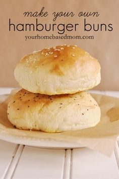 two biscuits on a plate with the words made your own hamburger buns