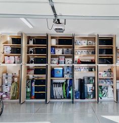 a bike is parked in front of some shelves with items on them and other boxes