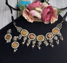 Add charm and charisma to your beautiful personality with this beautifully designed and handcrafted Brass necklace. The antique finish gives this Necklace a very eye-catching look. Choker is also designed beautifully with stones and designed as u can wear as necklace or choker and compliments very well. Wear it with any of your formal, party or casual outfits and grab compliments all the necklace only material brass