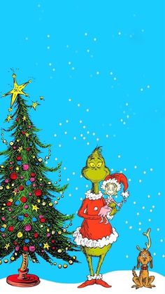 dr seuss and the grin in front of a christmas tree