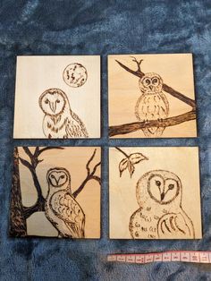 four wooden coasters with owls on them