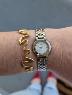 Vintage SEIKO Two Tone Round Quartz Watch with New Battery.  Best fits 7" wrist or smaller. Some of the gold detail has faded from the band, see photos for details. Note this is a vintage watch and sold as is. Local pick-up or delivery available in the Los Angeles area. Contact me to arrange a local pick up and I will waive the shipping fee. »» Please note our items are vintage and pre-loved, so they will most likely have some wear to them. However, any major noticeable flaws will be listed in the item's description. »» Follow me on Instagram! @emptypropaganda Stacked Jewelry, Seiko Watches, Custom Watch, Gold Details, Wrist Watches, Vintage Watches, Quartz Watch, Chic Outfits, The Gold