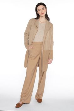 A person with long dark hair stands against a white background Faux Fur Accessories, Camel Style, Jacquard Cardigan, Long Open Cardigan, Chic Cardigan, Holdall Bag, Black Flannel, Jacquard Design, Mac Jeans