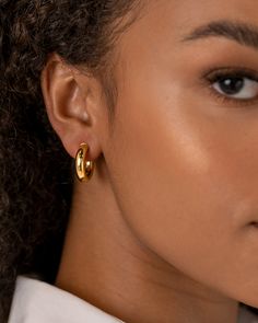 If there is one trend you NEED to jump on the bandwagon for, it’s chunky hoops earrings. These hoops are so perfectly thick, beautiful, and everything you need in a hoop earring. Pop these on with absolutely anything and completely transform your look. Materials Stainless Steel Post. 14K yellow, rose or white gold plated Measurements: Diameter: 20mm (.79”), 30mm (1.18”), 40mm (1.57”); 50mm (1.97”); Width: 4.5mm (.18”) Hypoallergenic; nickel, lead, and cadmium free