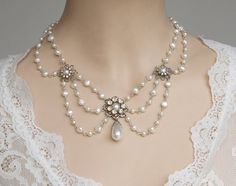 **** Photography by Alyssa Nikole Garza from Texas Amazing bridal wedding choker necklace features three silver plated filigree flowers set with Ivory white freshwater pearls surrounded with Swarovski AB rhinestone and connected between each flower with curled eye pins white freshwater Victorian Wedding Jewelry, Wedding Pearl Necklace, Vintage Bridal Necklace, Wedding Victorian, Wedding Choker Necklace, Simple Bridal Jewelry, Boho Bridal Jewelry, Jewelry Pearls, Victorian Necklace