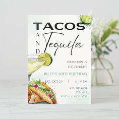 a tacos and tequila birthday party card with a drink in a glass next to it