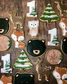 decorated cookies are arranged on a table with numbers 1 - 10 and animals in the background