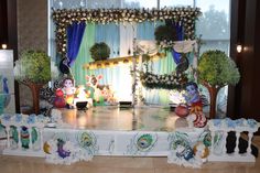 an elaborately decorated stage set up for a children's birthday party