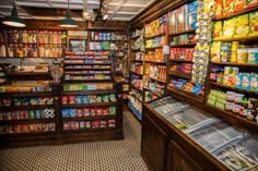 a store filled with lots of different types of food and snacks on shelves next to each other