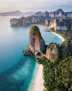 an aerial view of the beach and surrounding mountains in phangru island, thailand