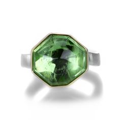 This sterling silver ring from Jamie Joseph will have you feeling giddy in green! Featuring an asymmetrical, faceted peridot set in a 14k yellow gold bezel, this unique ring gives a nod to the power of love. Stone measures 5/8" x 1/2". Size 7. Handcrafted in Seattle, WA, U.S. Jamie Joseph Jewelry, Power Of Love, The Power Of Love, Peridot Ring, Unique Ring, Stone Necklace, Unique Rings, Gemstone Earrings, Sterling Silver Ring