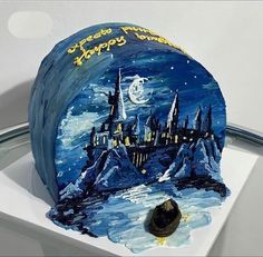 a cake that has been decorated to look like hogwart's castle on it