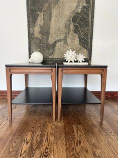 two wooden tables sitting on top of a hard wood floor