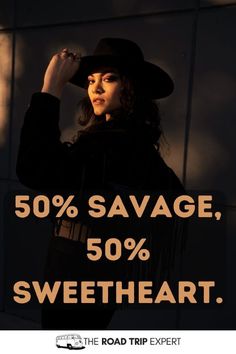 a woman wearing a black hat and holding her hand up to her face with the words 50 % savage, 50 % sweetheart