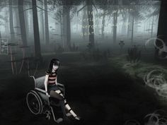 a woman sitting in a wheel chair in the woods