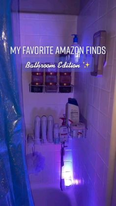 the bathroom is lit up with purple lights