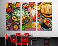 three pictures of food on the wall in a dining room with red chairs and table