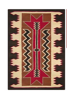 an old navajo rug with red and brown designs on the front, black and white background