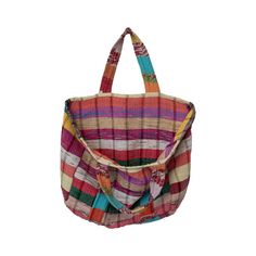 Meet your new favorite picnic, market, beach day, over-night, library books, catch-all tote bag! Each one of these vintage fabric bags is crafted with a completely unique patchwork design that makes each tote one-of-kind! This durable and beautiful bag is spacious, practical and ideal for everyday, shopping, laptop or travel + so much more! Material: Woven Recycled Fabric (Each Tote Will Vary in colors) Size: 18"L x 12"H x 5" Deep, Strap length 24" Features: Long handles with reinforced cross st Beach Patchwork Tote Bag, Beach Tote Bag With Patchwork, Bohemian Rectangular Shoulder Bag For Picnic, Rectangular Patchwork Shoulder Bag For Beach, Bohemian Tote Shoulder Bag For Picnic, Beach Rectangular Patchwork Shoulder Bag, Rectangular Patchwork Beach Shoulder Bag, Upcycled Multicolor Tote Bag, Rectangular Patchwork Bags For The Beach