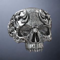 This Silver Skull Oxidized Ring is designed with a baroque-inspired style, featuring intricate skull details that give it a unique gothic charm. Crafted from high-quality 925 sterling silver, the oxidized finish enhances the depth of the baroque patterns, making each detail stand out. This eye-catching piece is perfect for those who appreciate bold statement jewelry and gothic aesthetics. Its comfortable fit makes it suitable for everyday wear or as a striking accessory for special occasions. Wh Bold Statement Jewelry, Oxidized Ring, Gothic Ring, Viking Ring, Masonic Ring, Skull Pattern, Retro Ring, Gothic Rings, Animal Rings