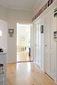 the hallway is clean and ready to be used as a home office or living room