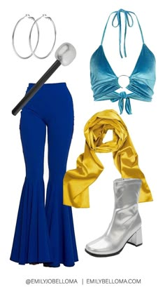 a woman in blue and yellow outfit with silver accessories