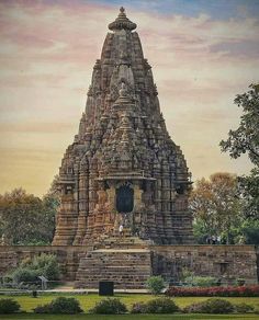 a large stone structure in the middle of a park