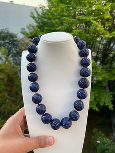 jewelry: real natural lapis lazuli necklace color: natural color--not dyed Diameter of bead: 20mm to 22.5 mm  Weight : 347 grams  body: with tiny blemish luster : high shape: round lapis grade: A---with more gold Necklace length: 21 inches the  Clasp: silver  Packing:Beautiful Pouch Royal Blue Lapis Lazuli Necklaces With Round Beads, Royal Blue Lapis Lazuli Necklace With Round Beads, Blue Lapis Lazuli Round Necklace, Blue Lapis Lazuli Necklace With Large Beads, Blue Lapis Lazuli Jewelry With Large Beads, Handmade Blue Sodalite Necklaces, Royal Blue Round Beads Necklace For Gift, Lapis Lazuli Beaded Necklaces With Large Beads As Gift, Lapis Lazuli Beaded Necklace With Large Beads For Gift