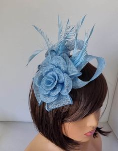 Light Blue Fascinator With Flower Headband and Clip Wedding Hat,Royal Ascot Ladies Day Size: approx :- 16cm x 13cm Small Size  Material:-,Feathers,Sinamay  Note :- I can't accept return.. Thanks                                                          Customer's returns fascinator or other items  to me so shop will deduct shipping cost from refund  Which shipping cost shop will pay or paid for customer orders  Thank you Blue Mini Hats With Handmade Flowers For Royal Ascot, Blue Adjustable Fascinator For Wedding, Adjustable Blue Fascinator For Wedding, Adjustable Blue Hair Accessories For Royal Ascot, Blue Wedding Fascinator With Handmade Flowers, Blue Headband For Spring Wedding, Adjustable Blue Mini Hat For Wedding, Blue Mini Hats With Handmade Flowers And Adjustable Fit, Adjustable Blue Mini Hats For Weddings