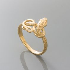 14k Yellow Gold Snake Band Ring, Engraved (Size 7) Image Enlarged To Show Detail. Weight/Sizes Approximate Made In The U.S.A. Snake Ring Band To Order With Gift Box, Select Gift Wrap Option During Checkout 2.5 Grams Total Metal Weight. Band Measures 2.18mm Wide X .73mm Thick At The Thinnest Point. Snake Measures 13.75mm From Head To Tail. Ring Size 7 Mcqgk4541 Luxury Gold Snake Ring For Anniversary, Classic Gold Snake Ring Gift, Luxury Gold Hallmarked Snake Ring, Luxury Hallmarked Gold Snake Ring, Sterling Silver Snake Ring In Yellow Gold For Anniversary, Gold Luxury Snake Ring For Promise, 14k Gold Snake Ring For Promise, Gold 14k Gold Snake Promise Ring, 14k Gold Snake Promise Ring