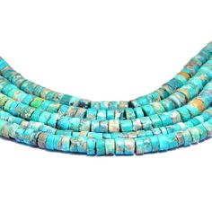 three strands of turquoise and gold beads