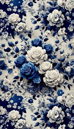 blue and white flowers are arranged on a floral pattern in this photo, it looks like they have been made out of paper