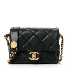 This is an authentic CHANEL Caviar Quilted Mini Twist Your Buttons Flap in Black. The chic mini crossbody classic is crafted in soft quilted caviar leather in black. The bag features an aged gold chain link leather threaded shoulder strap and a facing classic aged gold CC turn lock. This opens the flap to a red fabric interior with a patch pocket. Mini Twists, Leather Thread, Chanel Caviar, Mini Crossbody, Red Fabric, The Chic, Chain Link, Gold Chain, Patch Pocket