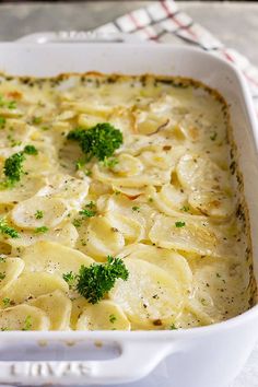 a casserole dish filled with pasta and broccoli