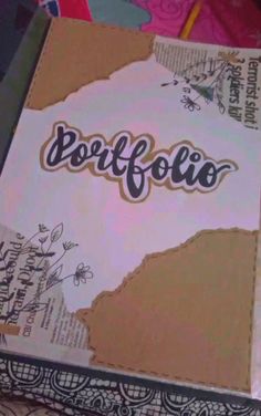 an open book with the word borffolio written on it's cover