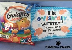 two bags of candy sitting on top of a shelf next to each other in front of a sign that says, it is orish silly summer thanks for a terrible school year