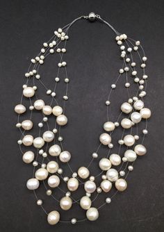 "A gorgeous piece multi strand floating pearls necklace there are 6 strand baroque pearl beautiful combination with nice magnetic clasp perfect for any occasions measures 16\" - 20\" length and total weight of 87.8 grams." Multi-strand Pearl Drop Necklace, Multi-strand Pearl Necklace With Pearl Charm, Multi-strand Pearl White Necklace With Pearl Pendant, White Multi-strand Pearl Necklace, Floating Pearl Necklace, Multi Strand Pearl Necklace, Bezel Necklace, Black Onyx Necklace, Pearls Necklace