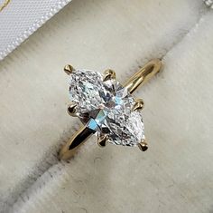 RING DETAILS METAL: available in Sterling Silver 925/10K/14k or 18k solid yellow gold, white gold, rose gold Engagement Ring ✦ Center stone: Simulated Diamond/Moissanite Diamond ✦ Center Stone Shape: Marquise Cut ✦ Size/Weight: 2.50 Carat/14*7 MM ✦ Stone Color: White ✦ Clarity: Excellent Please visit our store for more jewelry https://www.etsy.com/shop/FriendsJewelleryArt IMPORTANT INFORMATION ------Warranty Information------ We offer a 30 Days warranty for all of our jewelry. Please message me for more details. ------Every purchase includes a beautiful jewelry boxes.------- ------Working and Shipping time------    All Items are made to order for each customer. Please allow 2-3 weeks after purchase for shipping.� ------CUSTOM DESIGN AVAILABLE------- Please feel free to contact me with cust Marquise Solitaire, Wedding Ring For Women, Jewellery Marketing, Wedding Anniversary Rings, Hidden Halo, Ring Sizes, Cz Diamond, Rose Gold Engagement Ring, Marquise Cut