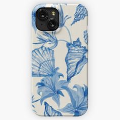 an iphone case with blue flowers and leaves on the back, in front of a white background