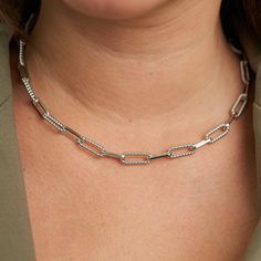 Silver Twisted Links Necklace - Waterproof, Hypoallergenic, Nickle Free, 20" length, Lobster Clasp - Elevate your jewelry collection with Aspen Double Necklace Silver, featuring intertwined chains in a timeless and minimalist design. Style Tip: Pair with a black turtleneck and tailored trousers for a modern and elegant look. Classic Silver Chain Jewelry With Paperclip Shape, Trendy Silver Chain Necklace With Rectangular Links, Classic Paperclip Silver Chain Jewelry, Trendy Sterling Silver Box Chain Necklace, Classic Metal Necklace With Paperclip Chain, Silver Paperclip Chain Choker, Classic Paperclip Necklace With Silver Chain, Classic Paperclip Silver Chain Necklace, Double Necklace Silver