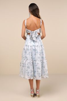 You'll be the toast of every occasion in a gorgeous look like the Lulus Marvelously Darling Light Blue Floral Tiered Backless Midi Dress! Ultra-airy woven chiffon boasts a darling floral print as it shapes slender straps that support a bustier-style bodice with seamed cups and a stunning open back with a sash tie. Fitted waist tops a tiered skirt that falls to a midi hem. Elastic at back for fit. Fit: This garment fits true to size. Length: Mid-calf length. Size medium measures 48.5" from should Backless Chiffon Dress For Brunch, Chiffon Backless Dress For Brunch, Breezy Blue Dress With Tie Back, Blue Breezy Midi Dress For Garden Party, Breezy Blue Midi Dress For Garden Party, Breezy Tie-back Midi Dress For Brunch, Blue Chiffon Midi Dress For Brunch, Midi Dress Floral, Backless Midi Dress