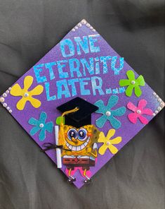 a purple and yellow graduation cap that says, one term into later