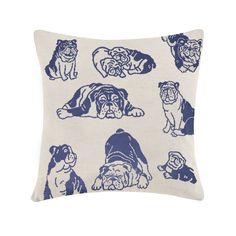 a blue and white pillow with bulldogs on the front, in various positions to be drawn