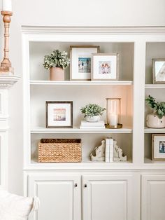 the shelves are filled with pictures and plants in vases, bookshelves, and baskets