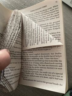 an open book with paper folded into it