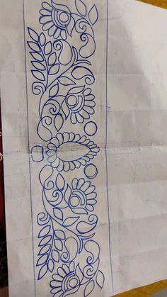 a piece of white paper with blue ink on it