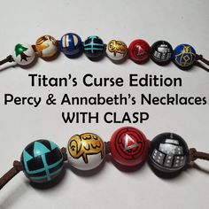 a bracelet with seven different colored beads and the words titan's curse edition percy and annebh necklaces no bow & arrow bead