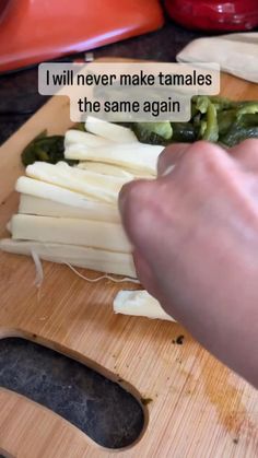 someone is cutting up some vegetables on a wooden board with the words i will never make tamales the same again